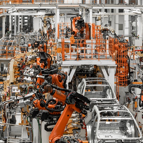Robotic assembly lines in a car manufacturing plant — automotive and ancillary industry staffing solutions.