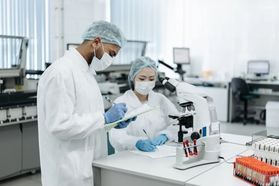 Scientists collaborating on pharmaceutical and healthcare research