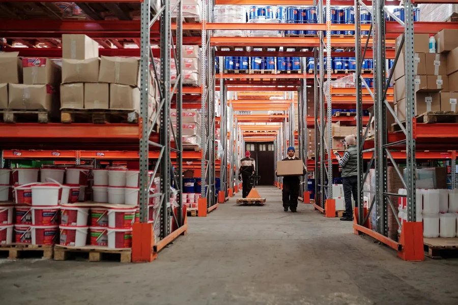 Ecommerce fulfilment workers handling boxes and inventory