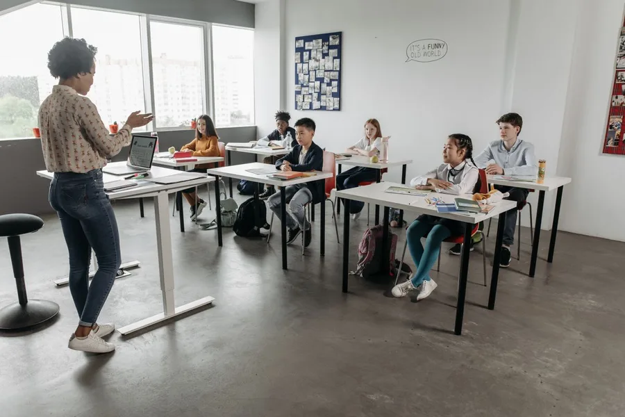 Teacher engaging students in a modern classroom