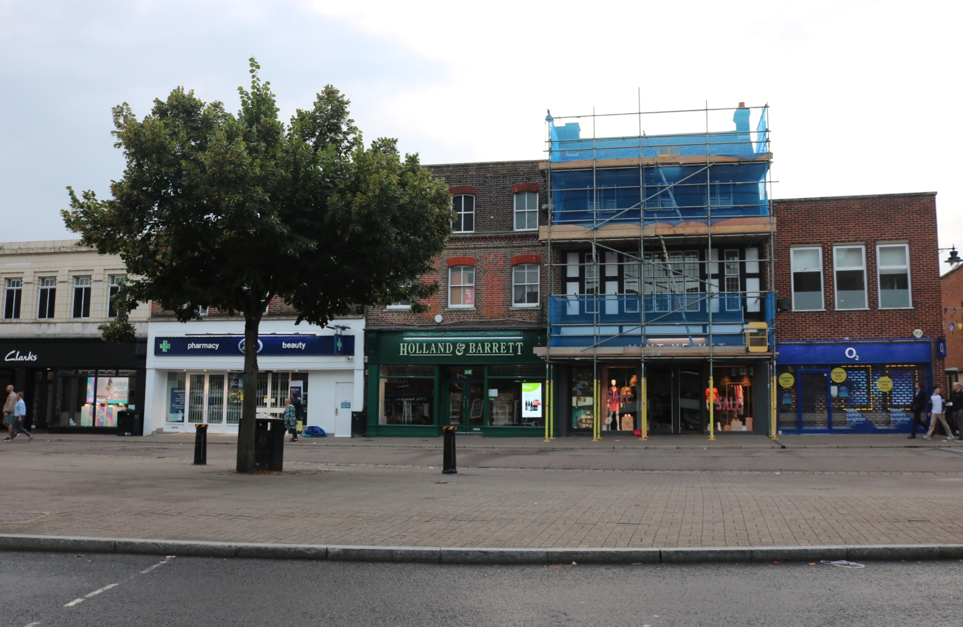 Shops and commercial buildings along High Street in St Albans, Hertfordshire